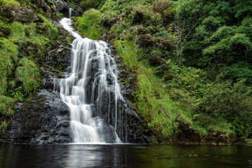Fototapeta na wymiar Long exposure shot of the famous Assaranca waterfall near Maghera, County Donegal, Ireland