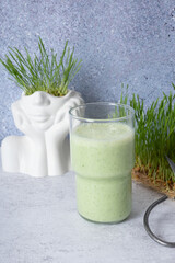 Smoothie with microgreeen and sprouted microgreen wheat sprouts. Healthy food concept