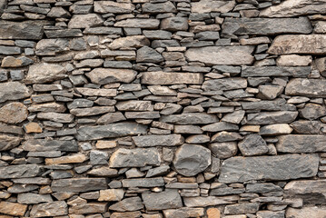 Rough background texture, showing a natural stone wall