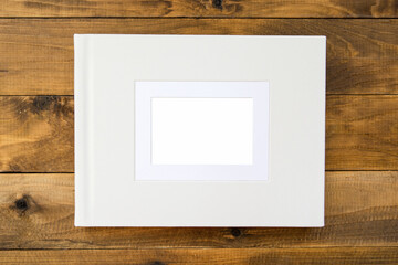 Photo album with leather hardcover and frame for design and personalization