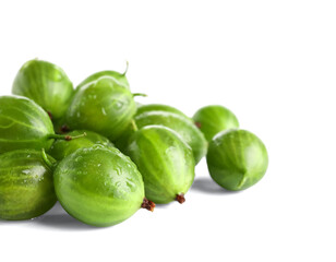 Heap of fresh gooseberries on white background