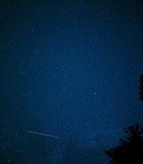 Fototapeta na wymiar Comet in the night starry sky