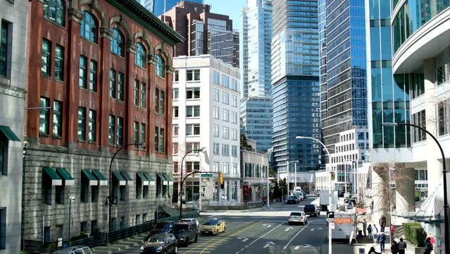 downtown Vancouver skytrain terminus Waterfront railway building people on the street Real life in Canada different nationalities travel walk Canada Vancouver 2023