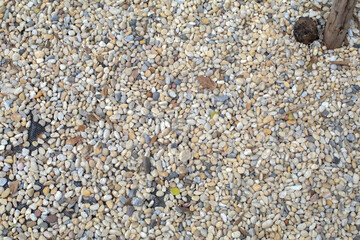 Small stone texture for background. Rough surface Gravel pebbles rock. Road building material. Stone landscaping.