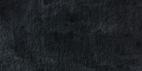 Black stone wall texture grunge rock surface. dark gray background backdrop. wide panoramic banner. old wall stone for dark black distressed grunge background wallpaper rough concrete wall.