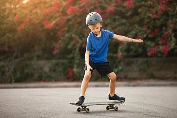 Foto op Aluminium Active boy skateboarding outdoors having fun  © kieferpix