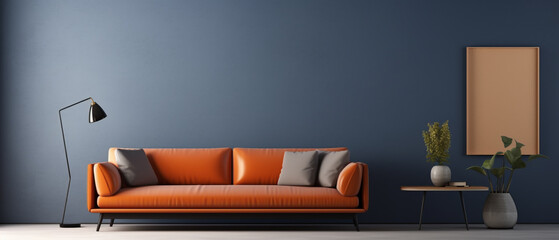 Modern living room with orange leather sofa and cushion. Large blue blank wall with space for furniture advertising. Wide panoramic advertising photograph with elegant sofa, lamp and frame.