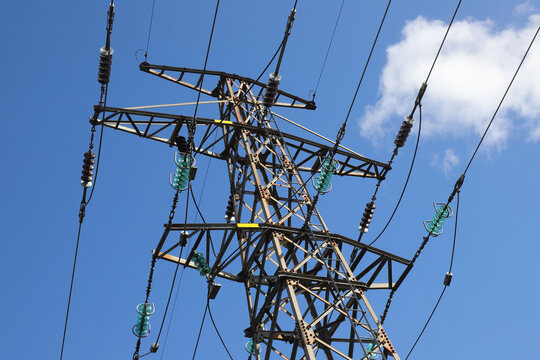 Low angle view of a hig voltage electrical pylon.