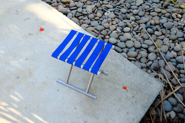 The Blue chair on the ground 