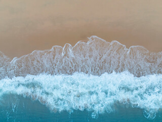 Fototapeta na wymiar Beach Wave water in the Tropical summer beach with white sand beach background