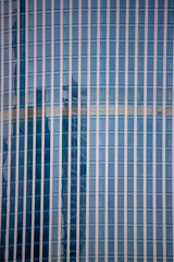 Fototapeta na wymiar Glass facade of a multi-storey office.