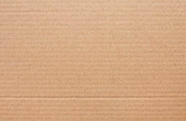 Cardboard sheet texture background, detail of recycle brown paper box pattern.