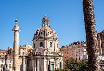 Fototapeta na wymiar Trajan's Column and Church of the Most Holy Name of Mary, Rome, Italy