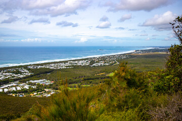 panorama of sunshine coast and coolum beach as seen from the top of mount coolum; aerial view of the coast of south east queensland, australia	