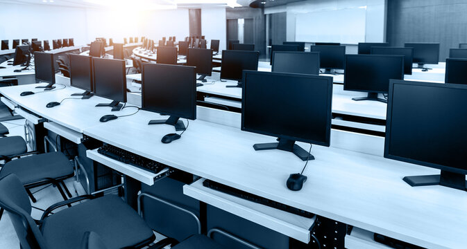 Group of computers neatly placed in a lab