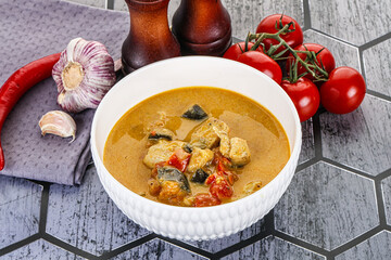 Traditional yellow Thai curry with chicken
