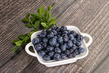 Ripe sweet blueberry in the bowl