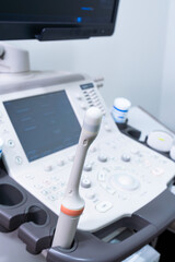 Fototapeta na wymiar Modern medical equipment. An ultrasound machine scanners and sensors in hospital clinic room