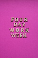 4 day work week symbol wooden letters four day working week concept. Modern approach doing business short workweek. Effectiveness of employees. Productivity and efficiency days off 