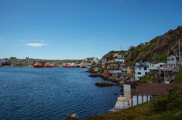 Fototapeta na wymiar View of houses and boats in harbour of St. John's, Newfoundland.