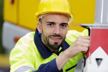 close view of construction worker wearing reflective gear