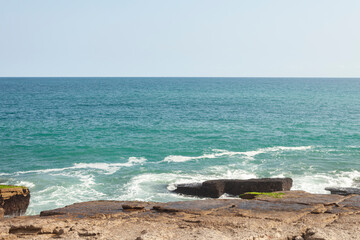 Fototapeta na wymiar rocks on the seashore on the beach