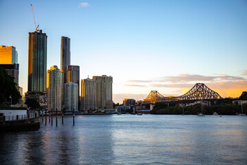 panorama of brisbane cbd on sunset; skyscrapers and famous story bridge in downtown of brisbane city in queensland, australia	 - obrazy, fototapety, plakaty