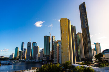 panorama of brisbane cbd on sunset; skyscrapers and famous story bridge in downtown of brisbane city in queensland, australia	