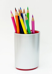 Colored pencils in a jar isolated on white background