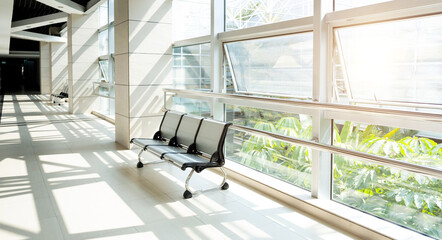 Row of chairs in modern office building