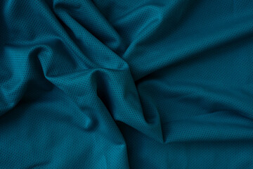 Blue sport fabric texture background. Sports shirt nylon's texture cloth. Royal Blue Jersey...