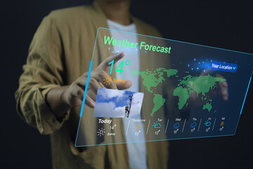 man in casual dress pointing hand to check the weather forecast on screen checking the weather during the day, such as temperature, wet dry bulb absulute humidity, relative, atmospheric pressure - obrazy, fototapety, plakaty