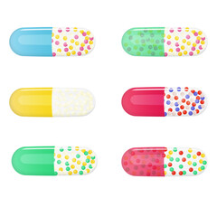 Different color medical pills in capsules