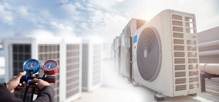 Air Conditioning (HVAC) On The Roof Of An Industrial Building.