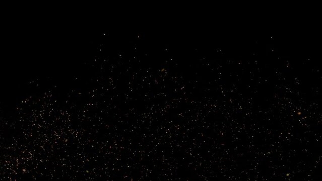 4k Fire embers fire sparks background,fire flames particles swirls in air, burning ash fire sparks. Particle dust cloud bonfire embers floating turbulent wind. Fiery glowing flying particles