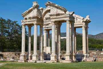 Tetrapylon ancient monument ruins in Aphrodisias. Archaeology landmark in Turkey