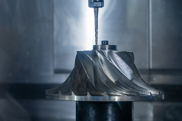 Demonstration of work of CNC milling machine drilling metal part, example of drilling metal blades...