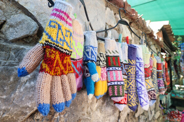 Local handmade knit gloves  cloth dolls and table cloth at Sirince, Izmir Turkey