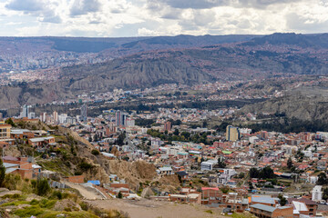 View from the scenic road to the landmark Muela del Diablo over the highest administrative capital, the city La Paz and El Alto in Bolivia
