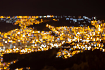 Blurred city lights of La Paz and El Alto, highest capital and vibrant city surrounded by the highest peaks of the Andes mountains in Bolivia