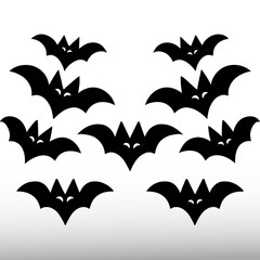 Naklejka premium Set of black silhouettes of bats on a white background. Vector illustration