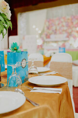 Wedding gift bag on a table. Catering table decor. Wedding ceremony.