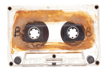 Close up of old audio tape cassette side B, isolated on white background, vintage 80's music concept.