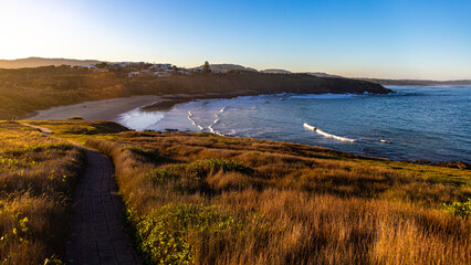 Scenic orange sunset at the beautiful unique Moonee Beach Nature Reserve. Look At Me Now Headland Walk, Coffs Harbour, NSW, Australia	