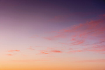 clouds on the sky at twilight. beautiful nature background in colorful light at dawn