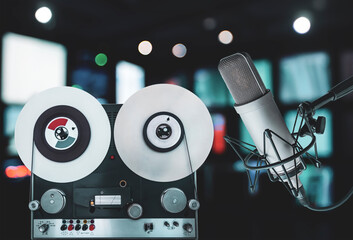 Professional microphone and tape recorder in sound studio