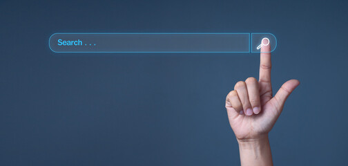 Businessman tapping search bar for SEO search concept to search information or data by internet...