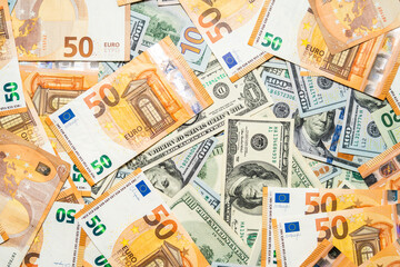 Money pile dollar and euro bills background