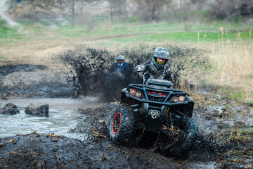 ATV, UTV, buggy, 4x4 off-road vehicle in muddy water. Extreme, adrenalin © Antonio