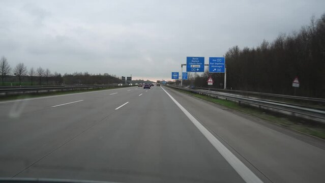 Fast driving on the german autobahn at day. Traffic on a German highway. no limits